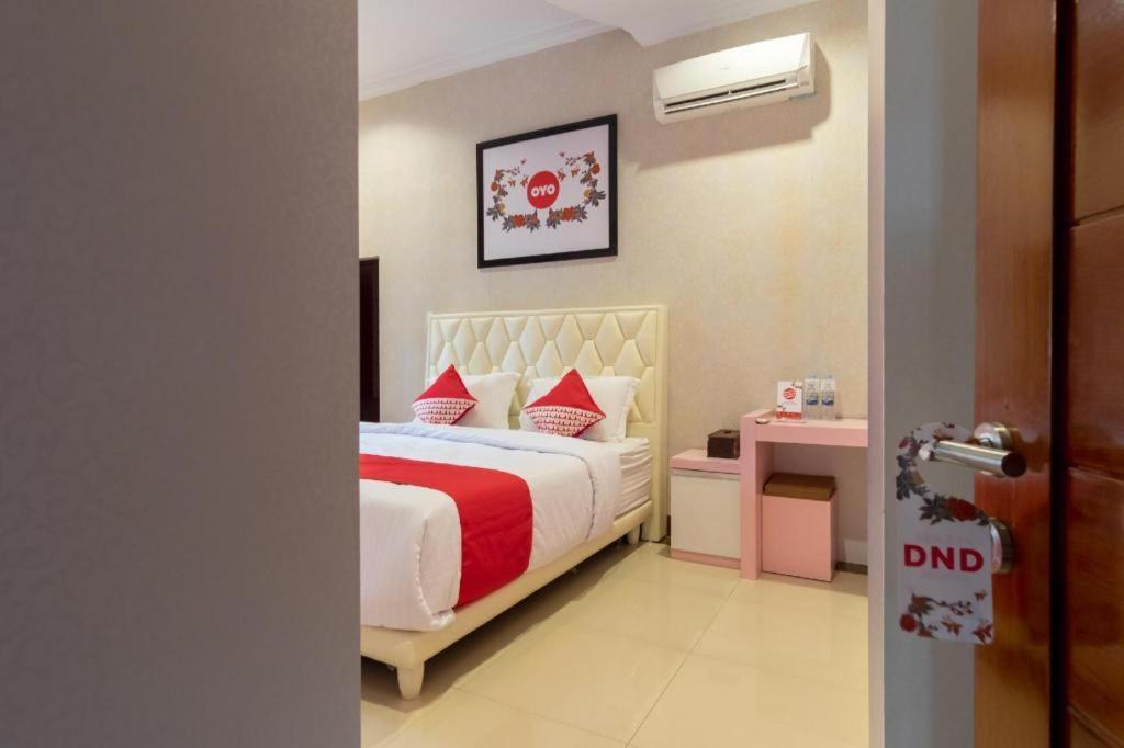 מדאן Oyo 619 Naufal Guest House Syariah מראה חיצוני תמונה