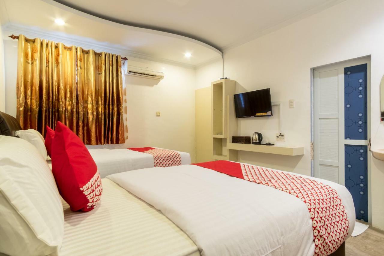 מדאן Oyo 619 Naufal Guest House Syariah מראה חיצוני תמונה